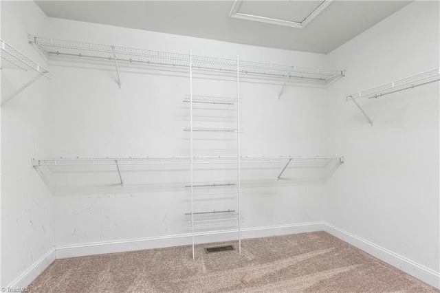 162 N Hazelwood Dr, Mocksville, NC 27028 - spacious closet featuring carpet and attic access