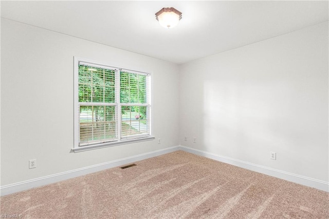 162 N Hazelwood Dr, Mocksville, NC 27028 - carpeted spare room with baseboards