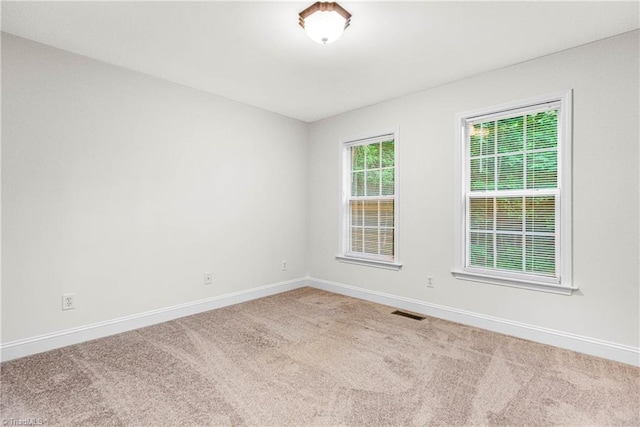 162 N Hazelwood Dr, Mocksville, NC 27028 - carpeted empty room with baseboards