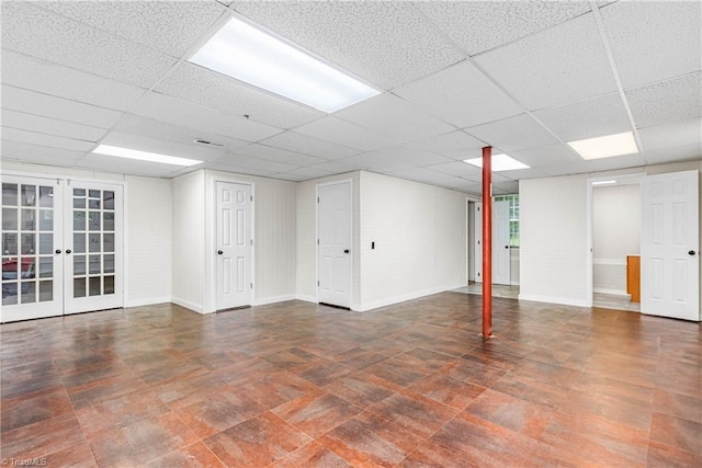 162 N Hazelwood Dr, Mocksville, NC 27028 - below grade area featuring a paneled ceiling and french doors
