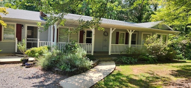 ranch-style home with covered porch