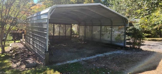 view of parking / parking lot with a carport