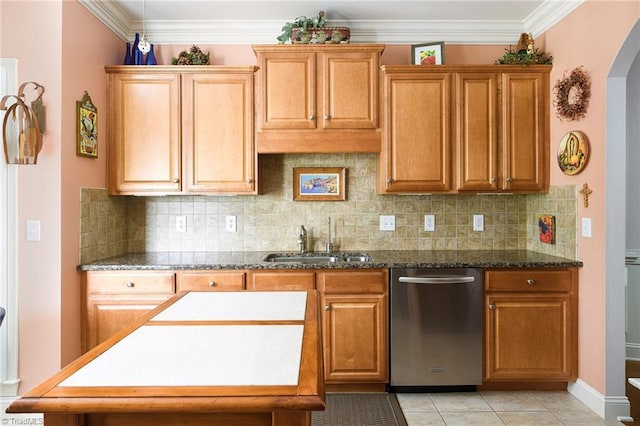 129 Turnbuckle Ct, Clemmons, NC 27012 - kitchen featuring stainless steel dishwasher, arched walkways, backsplash, light tile patterned floors, and crown molding