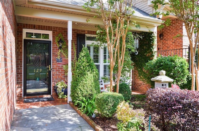 129 Turnbuckle Ct, Clemmons, NC 27012 - property entrance featuring brick siding and a shingled roof