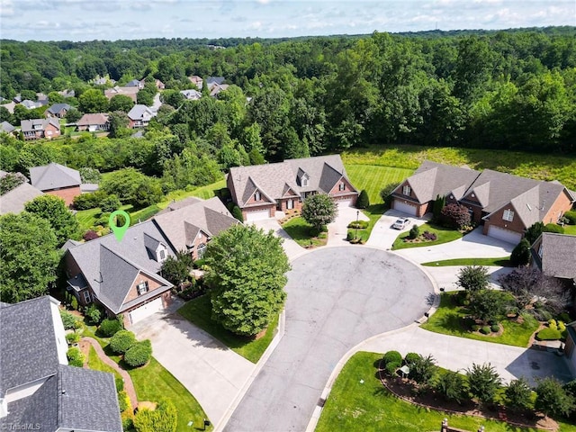 129 Turnbuckle Ct, Clemmons, NC 27012 - aerial perspective of suburban area featuring a heavily wooded area