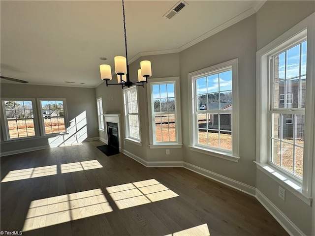 308 Grandworth Way, King, NC 27021 - unfurnished dining area with healthy amount of natural light, baseboards, a chandelier, crown molding, and dark wood-style flooring