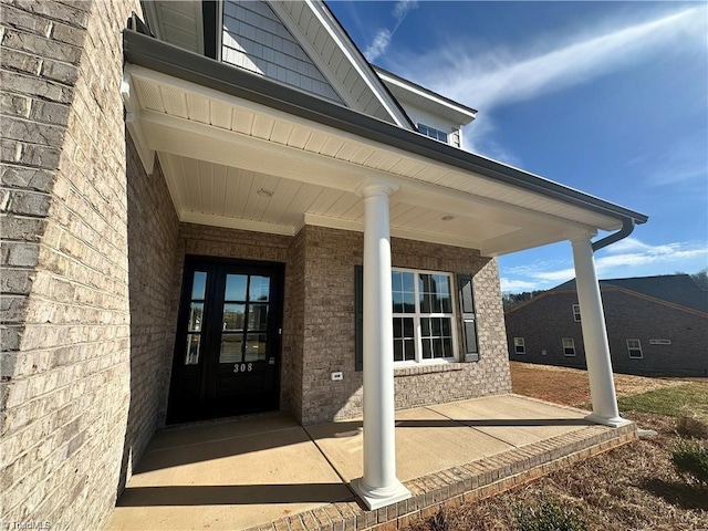 308 Grandworth Way, King, NC 27021 - doorway to property featuring brick siding and a porch