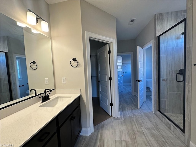 308 Grandworth Way, King, NC 27021 - full bathroom with a shower stall, vanity, toilet, and baseboards