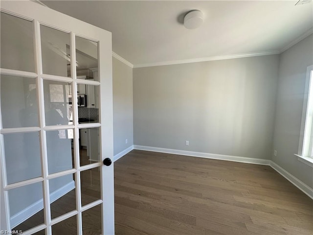 308 Grandworth Way, King, NC 27021 - empty room with crown molding, dark wood-type flooring, and baseboards