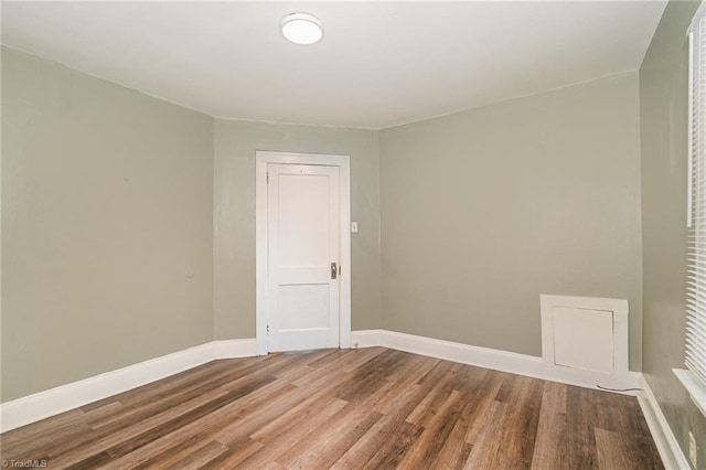 empty room featuring hardwood / wood-style floors