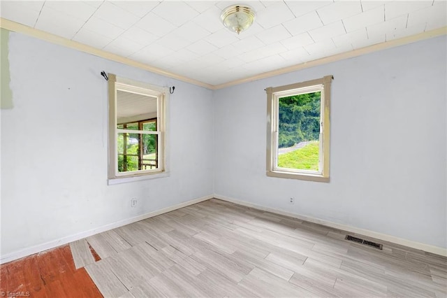 1198 Red Bank Rd, Germanton, NC 27019 - spare room with ornamental molding, wood finished floors, and baseboards