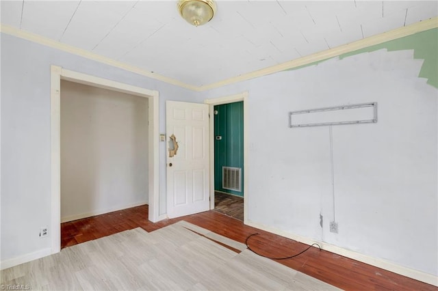1198 Red Bank Rd, Germanton, NC 27019 - empty room with ornamental molding, wood finished floors, and baseboards