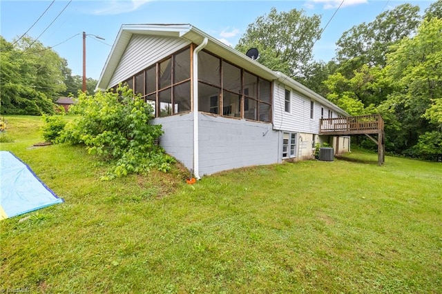 1198 Red Bank Rd, Germanton, NC 27019 - view of property exterior featuring a sunroom, a lawn, central AC, and a wooden deck