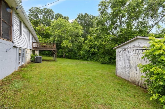 1198 Red Bank Rd, Germanton, NC 27019 - view of green lawn with central AC and a deck