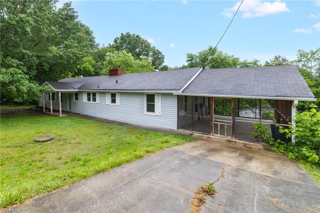 1198 Red Bank Rd, Germanton, NC 27019 - view of front of home with a chimney, a sunroom, and a front yard