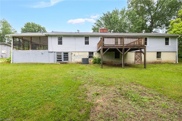 1198 Red Bank Rd, Germanton, NC 27019 - rear view of property featuring a deck, a yard, a sunroom, and central air condition unit