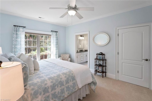 carpeted bedroom featuring ornamental molding, connected bathroom, and ceiling fan