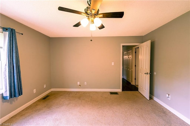 5750 Gayray St, Clemmons, NC 27012 - carpeted empty room featuring ceiling fan and baseboards