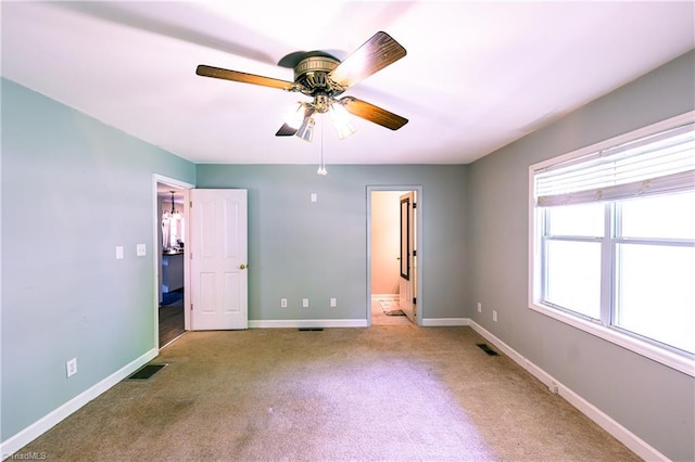 5750 Gayray St, Clemmons, NC 27012 - unfurnished bedroom featuring carpet and a ceiling fan