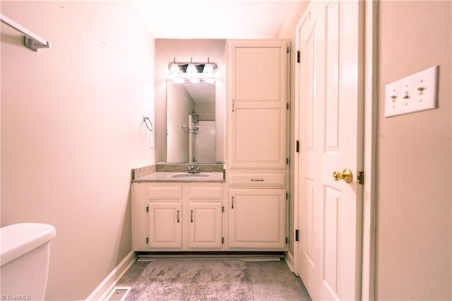 5750 Gayray St, Clemmons, NC 27012 - bathroom featuring toilet and vanity
