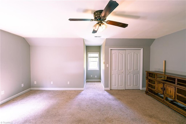 5750 Gayray St, Clemmons, NC 27012 - unfurnished bedroom featuring carpet, lofted ceiling, a ceiling fan, and a closet