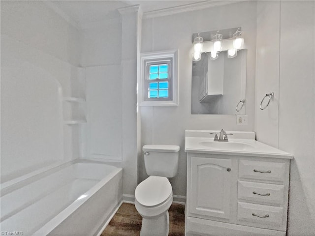 full bath with vanity, baseboards,  shower combination, crown molding, and toilet