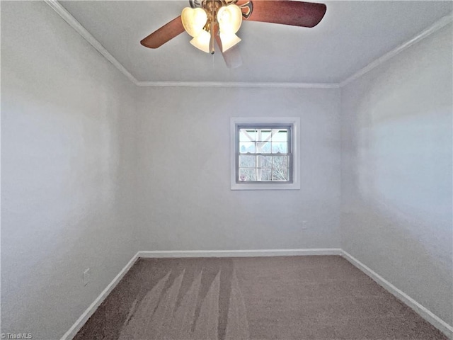 empty room with carpet flooring, ornamental molding, baseboards, and ceiling fan