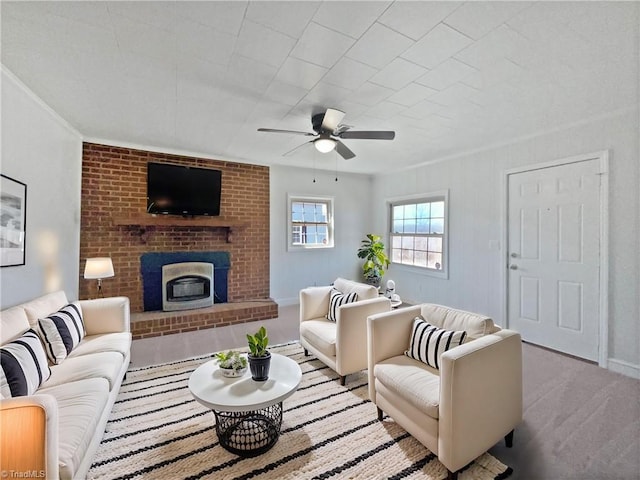 carpeted living area with baseboards and ceiling fan