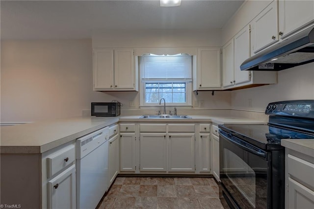 kitchen featuring white cabinetry, sink, and black appliances