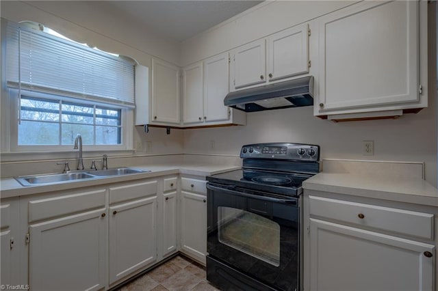 kitchen with black range with electric cooktop, sink, and white cabinets