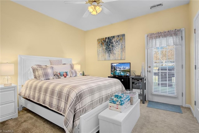 carpeted bedroom with ceiling fan