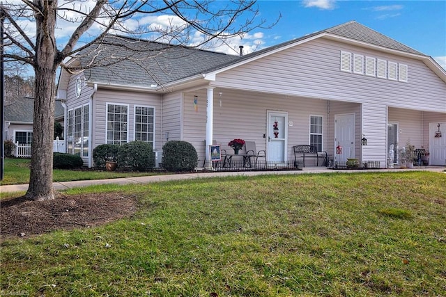 view of front of home with a front yard