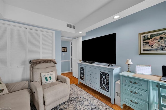 sitting room featuring light hardwood / wood-style floors