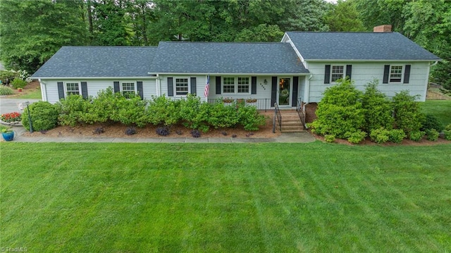 2205 Sedgemont Dr, Winston-Salem, NC 27103 - view of front facade featuring a chimney, a front lawn, a porch, and roof with shingles