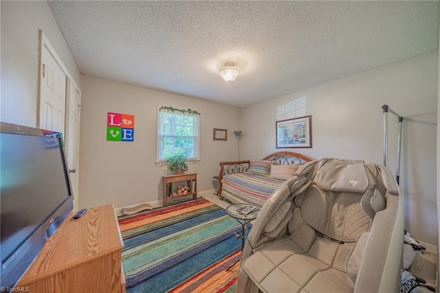 2205 Sedgemont Dr, Winston-Salem, NC 27103 - carpeted bedroom with a textured ceiling