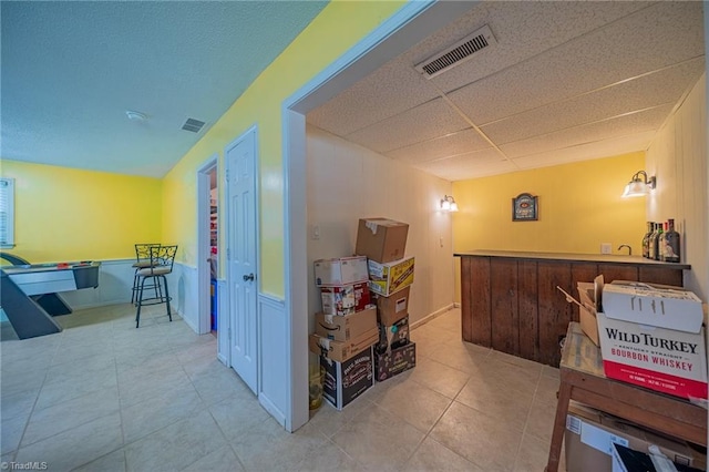 2205 Sedgemont Dr, Winston-Salem, NC 27103 - interior space featuring tile patterned flooring and a paneled ceiling