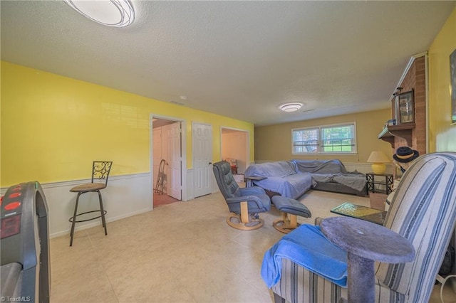 2205 Sedgemont Dr, Winston-Salem, NC 27103 - living room featuring a textured ceiling