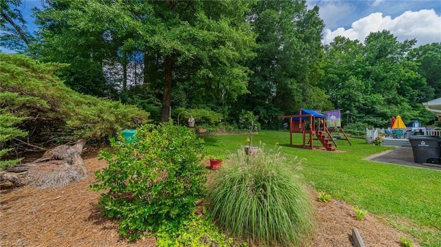 2205 Sedgemont Dr, Winston-Salem, NC 27103 - view of grassy yard featuring a playground