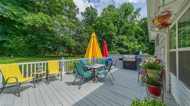 2205 Sedgemont Dr, Winston-Salem, NC 27103 - wooden terrace featuring outdoor dining space, a yard, and view of scattered trees