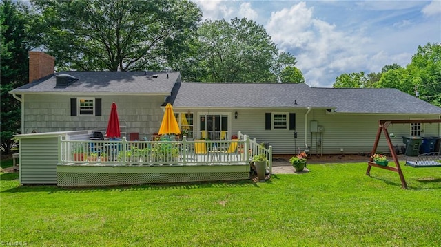 2205 Sedgemont Dr, Winston-Salem, NC 27103 - rear view of house with a deck, a lawn, and a chimney