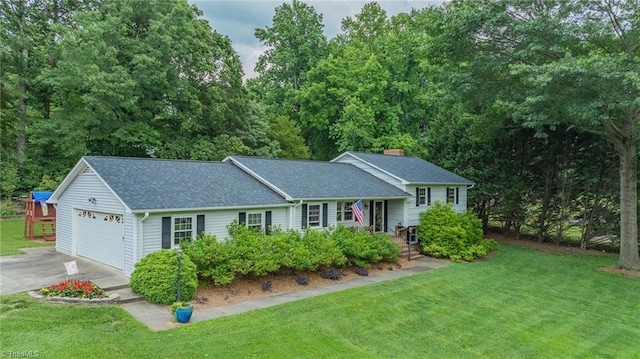 2205 Sedgemont Dr, Winston-Salem, NC 27103 - split level home with driveway, an attached garage, a front yard, roof with shingles, and a chimney