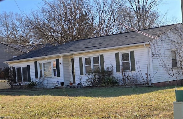 ranch-style house with a front yard