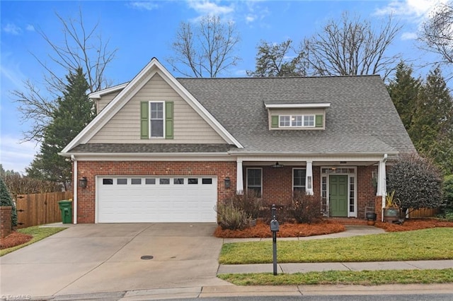 view of front facade with a garage and a front lawn