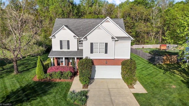 3809 Long Meadow Dr, Mebane, NC 27302 - traditional-style house with brick siding, an attached garage, a front yard, and concrete driveway