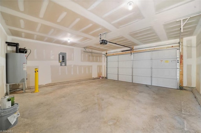 garage featuring electric panel, electric water heater, and a garage door opener