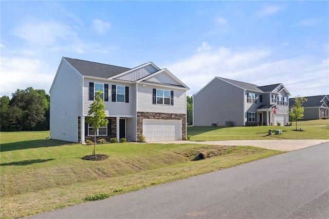 craftsman-style home featuring concrete driveway, stone siding, a front lawn, and a garage