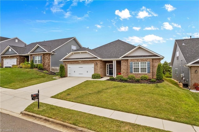 view of front of property with a front lawn and a garage