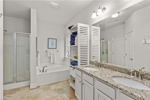 bathroom with plus walk in shower and vanity