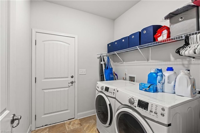 laundry room featuring washing machine and dryer