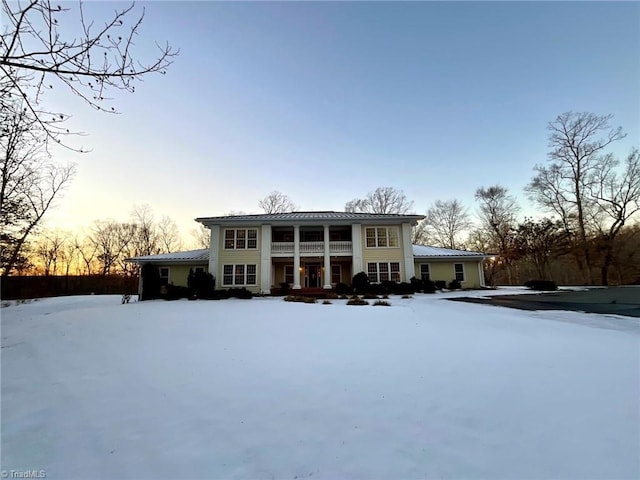 view of snow covered house